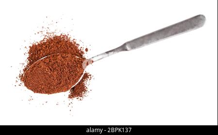 top view of pile of freshly ground coffee in spoon isolated on white background Stock Photo