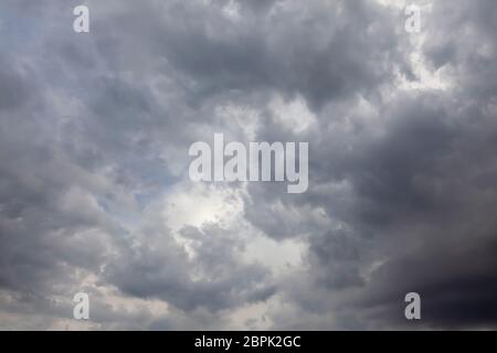 Stormy clouds and sky. Grey dark cloudscape with a storm brewing Stock Photo