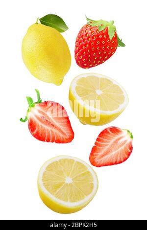 Flying fresh lemon and strawberry fruit isolated on white background with clipping path as package design element and advertising. Full depth of field Stock Photo