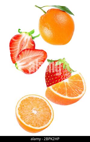 Flying fresh strawberry and orange fruit isolated on white background with clipping path as package design element and advertising. Full depth of fiel Stock Photo