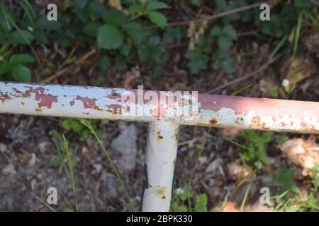 rusty old handle on a station stairway Stock Photo