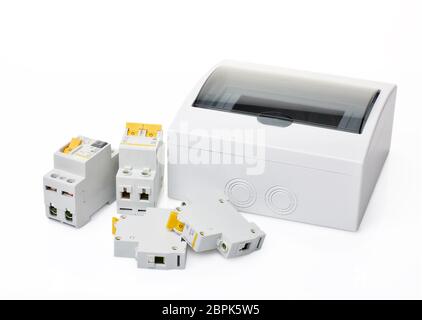 Automatic circuit breakers and distribution box on a white background. Electrical equipment. Accessories for protection and control electric. Stock Photo