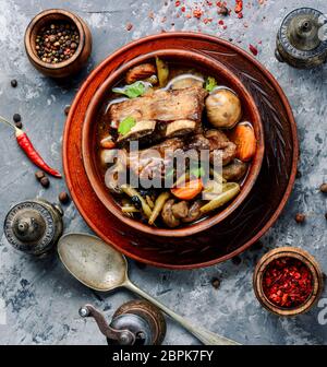 Cooking Stew meat in Burgundy or Beef Bourguignon.French cuisine Stock Photo