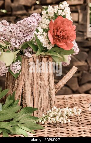 Bouquet with lilac and peony roses Stock Photo