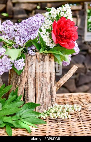 Bouquet with lilac and peony roses Stock Photo