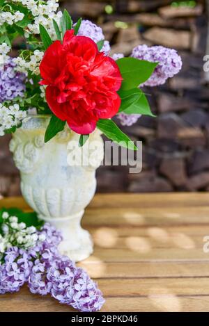 Bouquet with lilac and peony roses Stock Photo