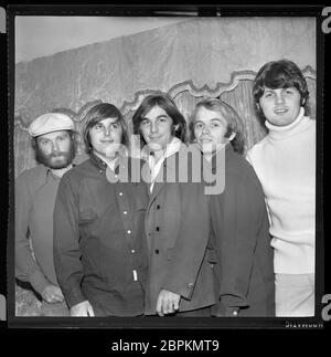 Beach Boys on their London tour, November 1966. Left to Right: Mike Love, Brian Wilson, Dennis Wilson, Al Jardine,  Carl Wilson. Image from 2.25 X 2.25 inch negative. Stock Photo