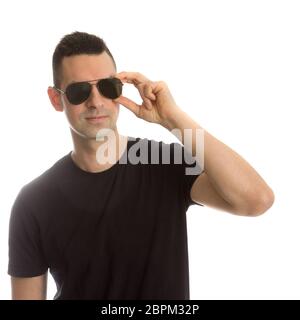 Headshot of a young man wearing aviator sunglasses, Stock Photo
