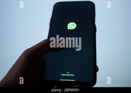 Jaipur, India, Circa 2020 - A mobile logged into the whatsapp mobile application infront of the white light board. The background board is brightly li Stock Photo