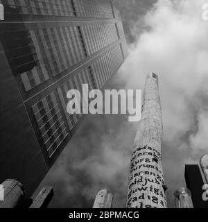 'Edge of the trees', a sculpture by Fiona Foley and Janet Laurence, black and white photo taken looking straight up at the sky, Sidney, New Wales, Aus Stock Photo