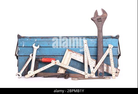 Old toolbox filled with vintage tools, isolated Stock Photo
