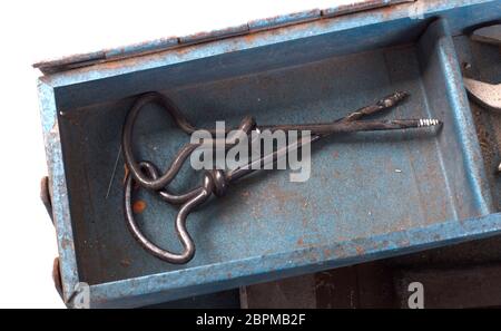 Old toolbox filled with vintage tools, isolated Stock Photo