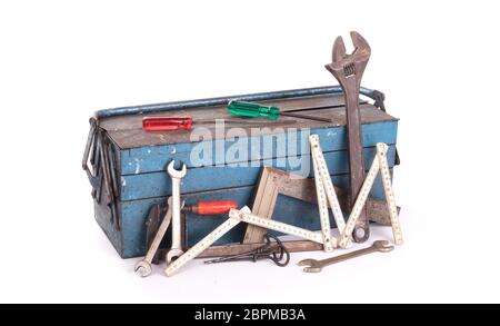 Old toolbox filled with vintage tools, isolated Stock Photo