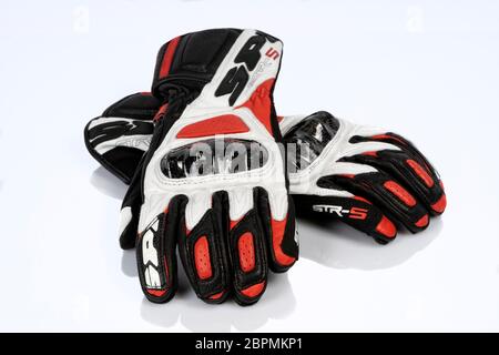 SPIDI STR-5 Red gloves isolated on white. Photograph taken on May 19, 2020 in Madrid, Spain. Stock Photo