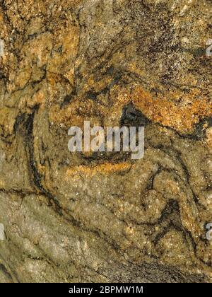 The background is undulating structurally stone marble corrosion. Stock Photo