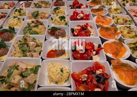 various dishes in bowls to choose from at the buffet Stock Photo