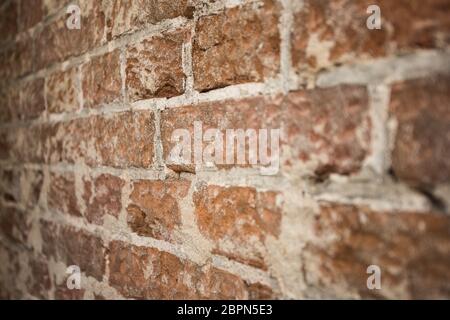 brick wall background texture close-up with blurred details building concept Stock Photo