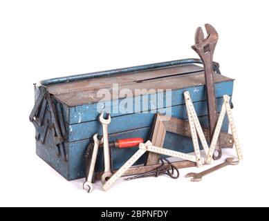 Old toolbox filled with vintage tools, isolated Stock Photo
