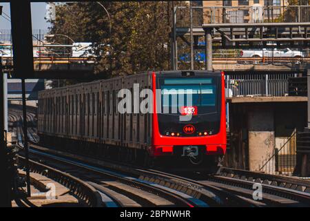 SANTIAGO, CHILE - MARCH 2020: A Santiago Metro train entering Los Héroes station of Line 2 Stock Photo