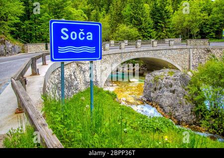 The Soca or Isonzo river sign in Slovenia - Triglav National Park . Stock Photo