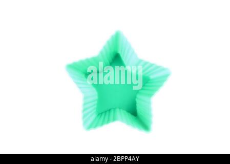 Silicone star shaped cookie baking dish isolated on a white background. Stock Photo