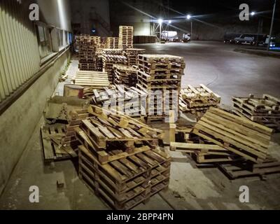 Pallet racks inside a cement plant. Loading shop of a cement plant. Stock Photo