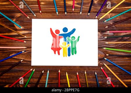 Family of plasticine on a wooden background. The concept of the family Stock Photo