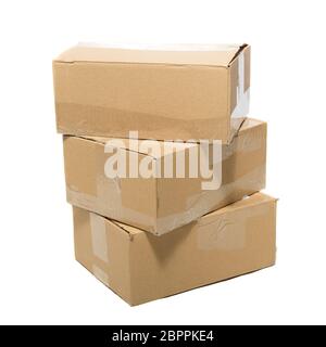 Three closed cardboard boxes packed with goods ready for shipping Stock Photo