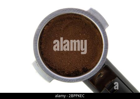 Espresso Maker Filter Holder with ground coffee on white background Stock Photo