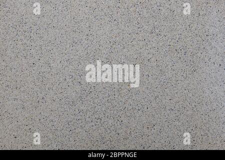 Close up small tiny stone pebble in concrete floor texture background Stock Photo