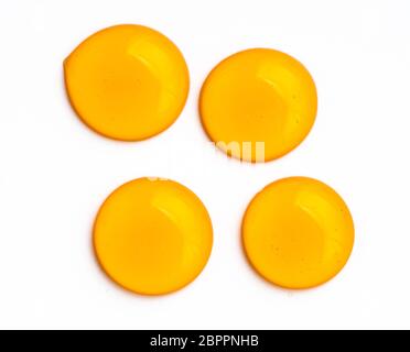 Honey drops. Honey for design elements. Abstract pattern from honey drops. Isolated on white with clipping path. Can use for design or text. Stock Photo