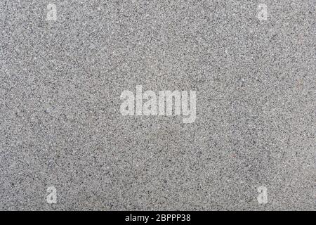 Close up small tiny stone pebble in concrete floor texture background Stock Photo