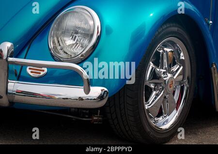 TORONTO, CANADA - 08 18 2018: Front part of exterior with wheel, fender, bumper, hood, front light of blue 1955 Volkswagen Beetle oldtimer car on Stock Photo