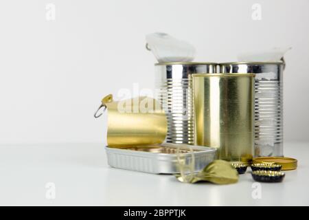 Pile of tin cans waiting to reuse. Metal recycling concept Stock Photo