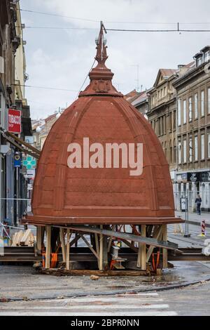 Zagreb, Croatia - April 16, 2020 : Damaged dome that was damaged by the earthquake of 5.5 on the Richter scale one month ago is lowered to the ground