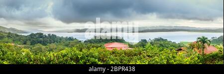 Panoramic view of Lake Arenal in central Costa Rica under dramatic cloudy sky Stock Photo