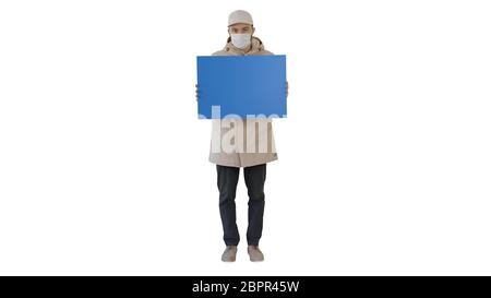 Casual man with copy space billboard wearing protective mask on white background. Stock Photo