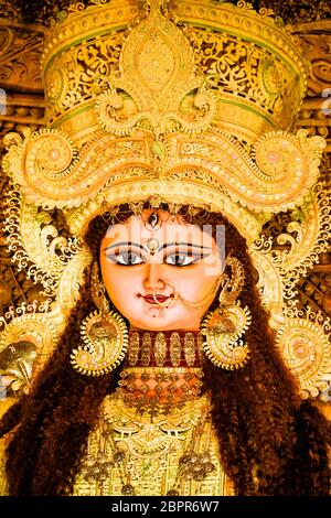 Chandannagar, West Bengal, India - November 16, 2018: Portrait of Hindu Goddess Jagadhatri Idol during Jagadhatri Puja celebration. Close up. Very wel Stock Photo