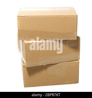 Three closed cardboard boxes packed with goods ready for shipping Stock Photo