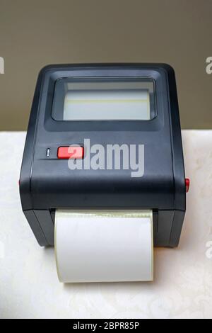 Small Barcode Label Printer Equipment for Distribution Warehouse Stock Photo
