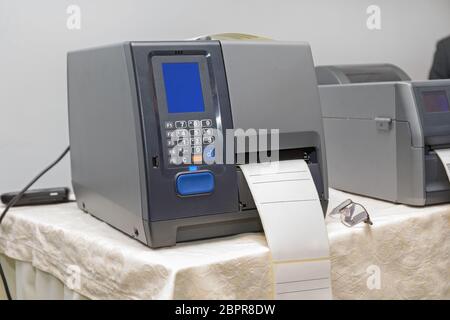 Barcode Label Printer Equipment for Distribution Warehouse Stock Photo