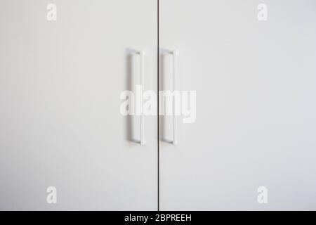 White closet doors wood closeup, modern design background texture Stock Photo