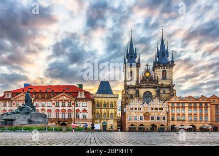 Old Town Square with Jan Hus Memorial, Kinsky Palace, the Church of Our Lady before Tyn and the Stone Bell House in Prague. Stock Photo