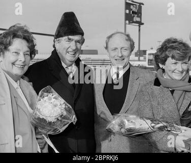 Labour leader Neil Kinnock with wife Glenys deputy leader Denis Healey and his wife Edna leaving London's Heathrow Airport in November 1984. Stock Photo