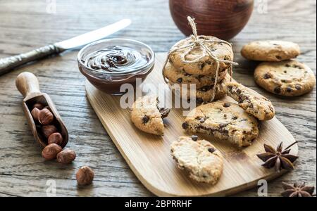Cookies with chocolate cream and hazelnuts Stock Photo
