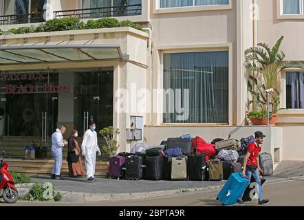 Beirut, Lebanon. 19th May, 2020. People returning from abroad arrive at a hotel in Beirut, Lebanon, on May 19, 2020. Lebanon's number of COVID-19 infections increased on Tuesday by 23 cases to 954, while the death toll remained unchanged at 26, the National News Agency reported. Credit: Bilal Jawich/Xinhua/Alamy Live News Stock Photo