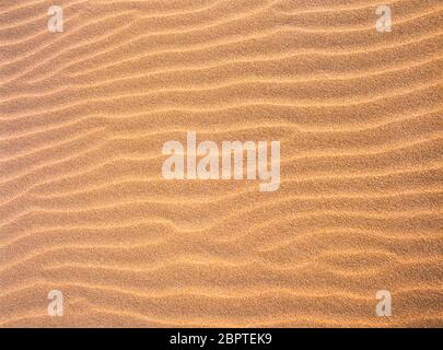 Pattern of wrinkles in sand Stock Photo