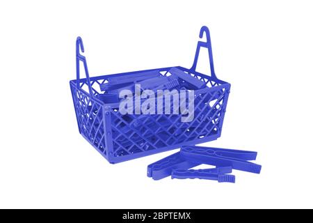 Pile of color plastic cloth clamps inside basket isolated on white Stock Photo