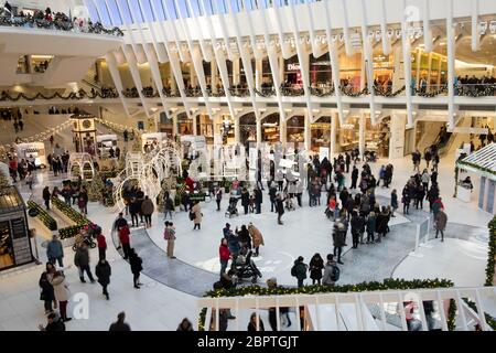 Crowds of People shop at the Westfield World Trade Center Shopping Mall at the World Trade Center Complex in Manhattan during Christmas, New York, USA Stock Photo