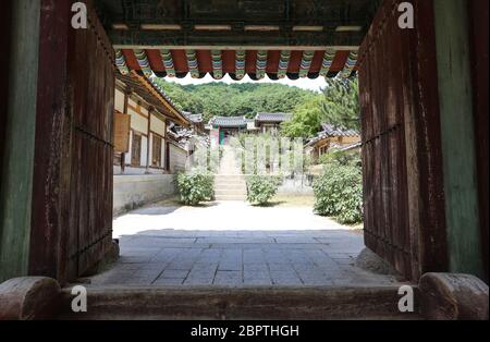 Inside view overlooking the front gate of Korean traditional house. Stock Photo